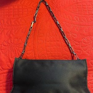Calvin Klein black satin purse.